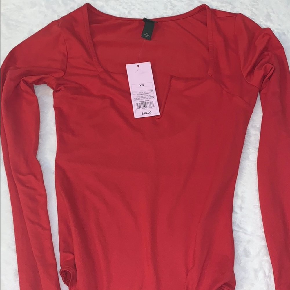 Red body suits never used
